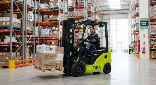 Modern high performance industrial electric forklift with lime green chassis and black mast operating in a clean modern pharmaceutical and FMCG distribution warehouse, bright daylight, high precision steel engineering, crisp photo
